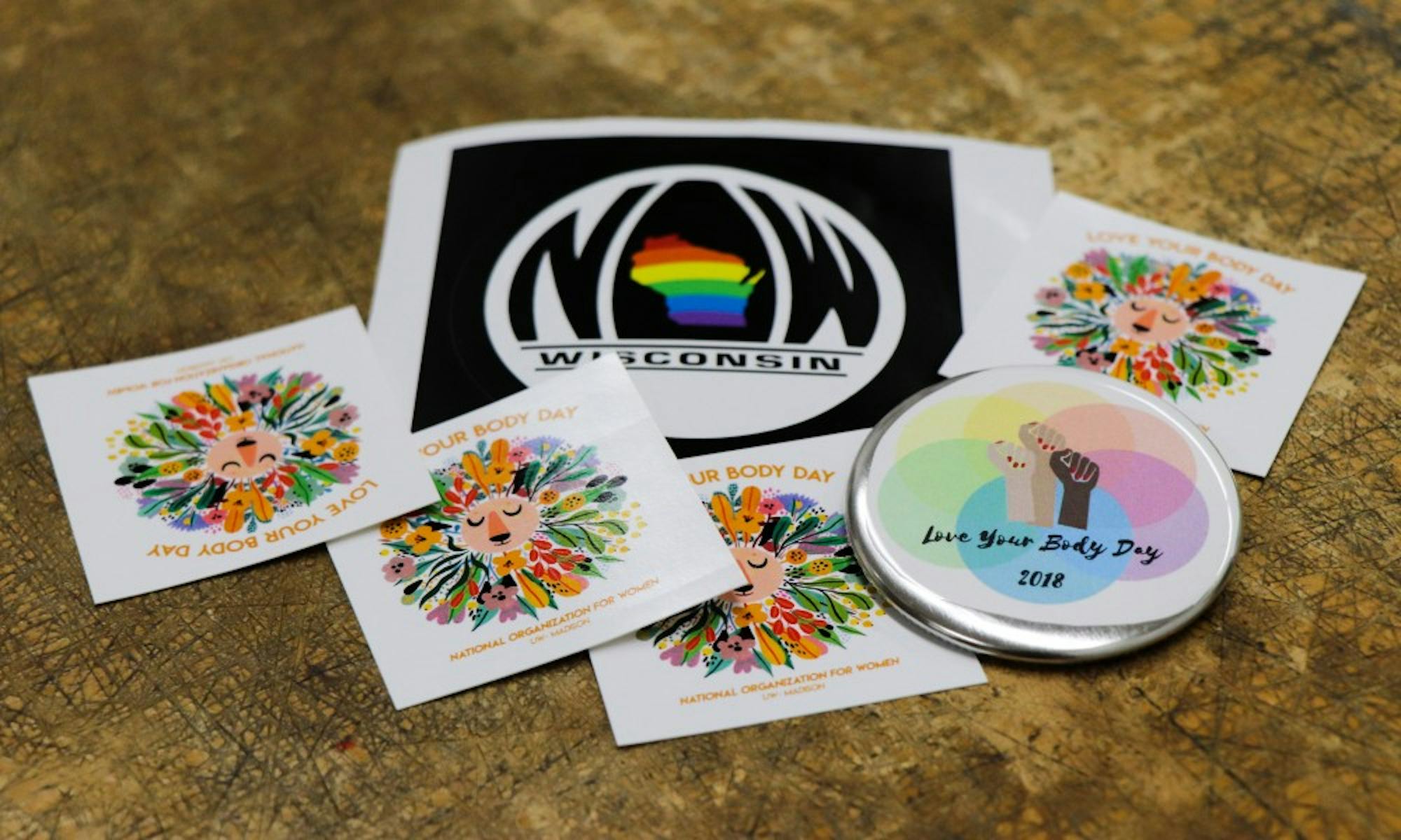 UW-Madison’s National Organization for Women handed out stickers and buttons promoting body love on the UW-Madison campus. 