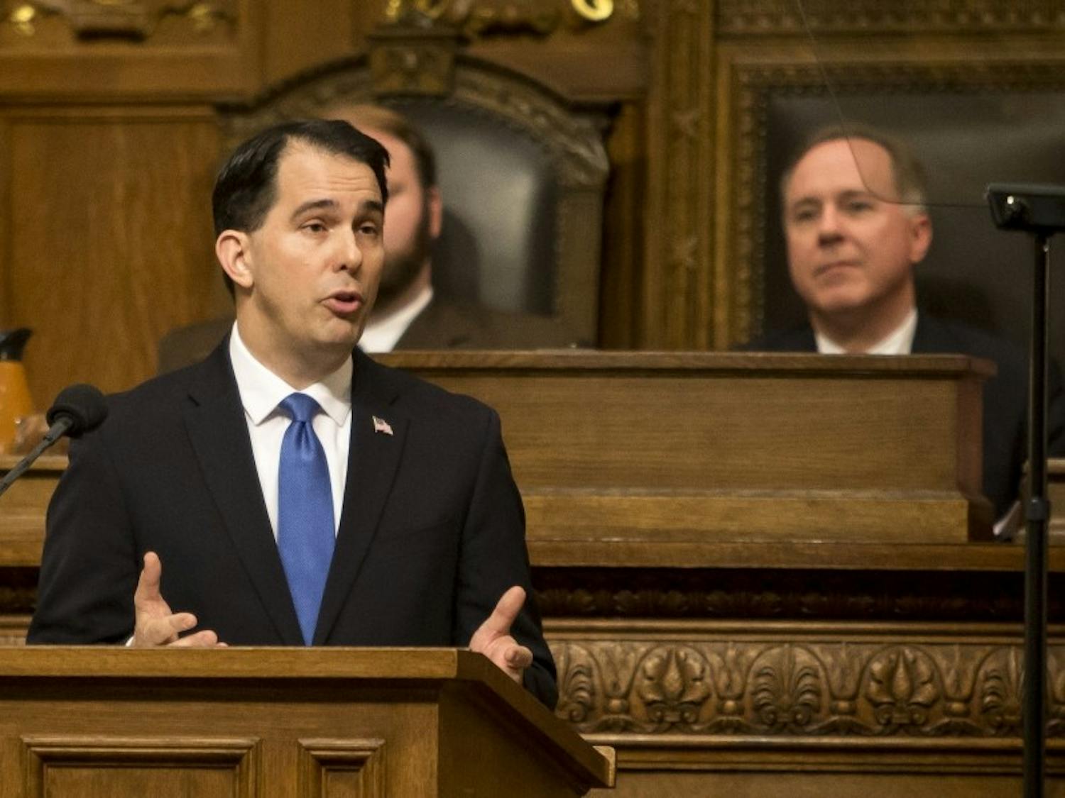 Gov. Scott Walker said he will cut tuition for in-state students at UW System schools.