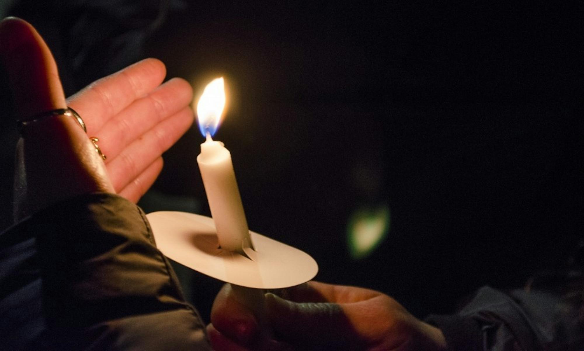 Community members from across Madison came together to mourn those killed in Saturday's mass shooting.