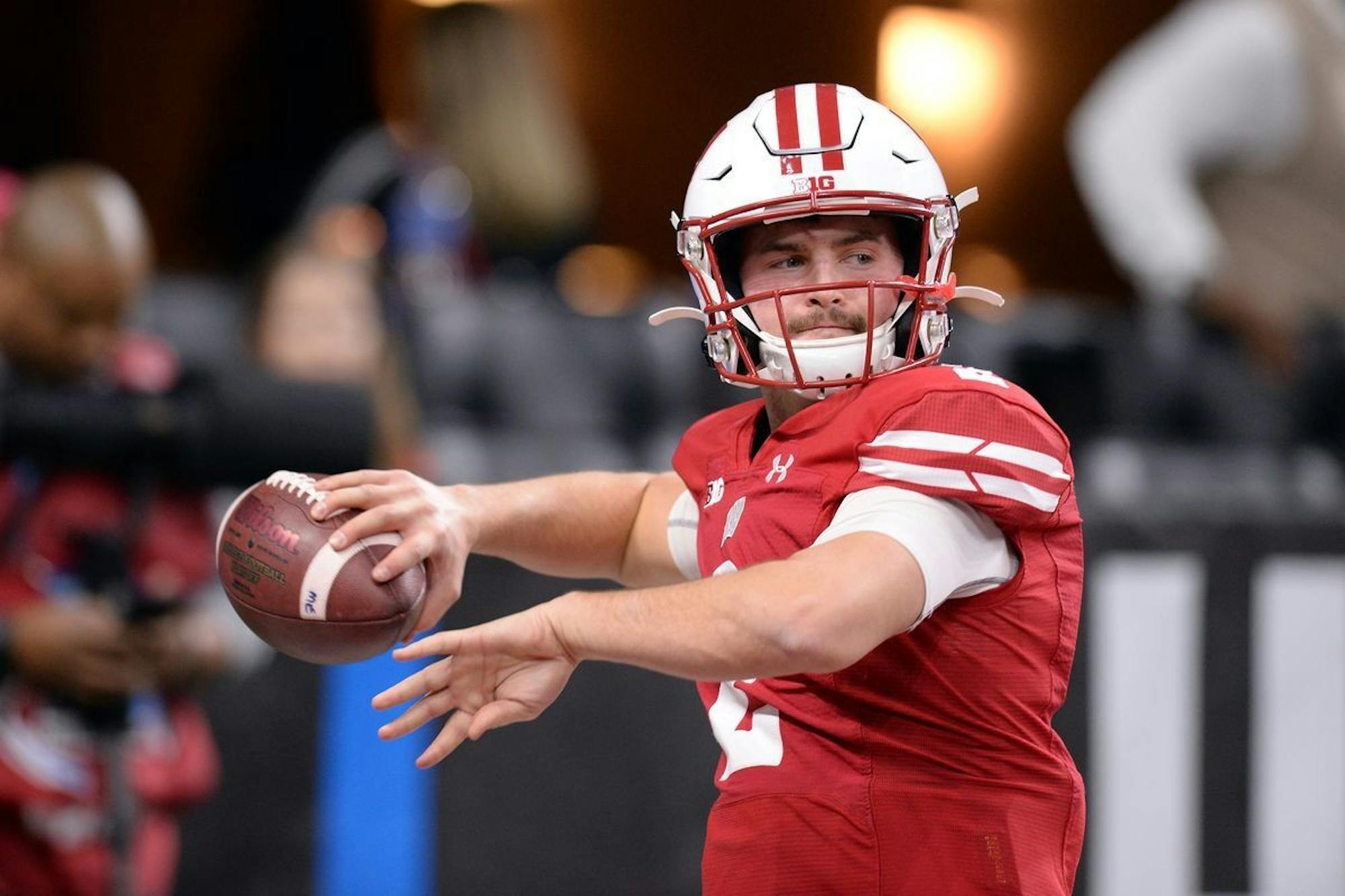 Photo of Chase Wolf throwing a football