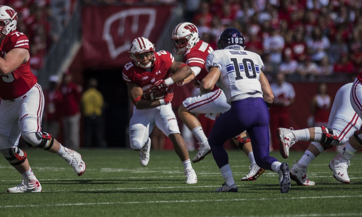 Wisconsin again improved in the second half, outscoring Northwestern by 12 points.