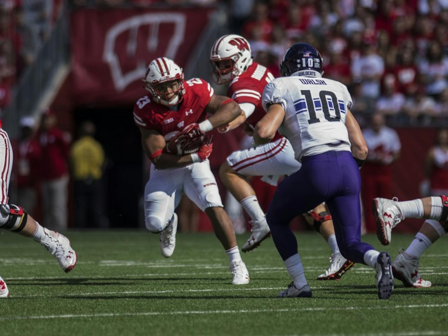Wisconsin again improved in the second half, outscoring Northwestern by 12 points.