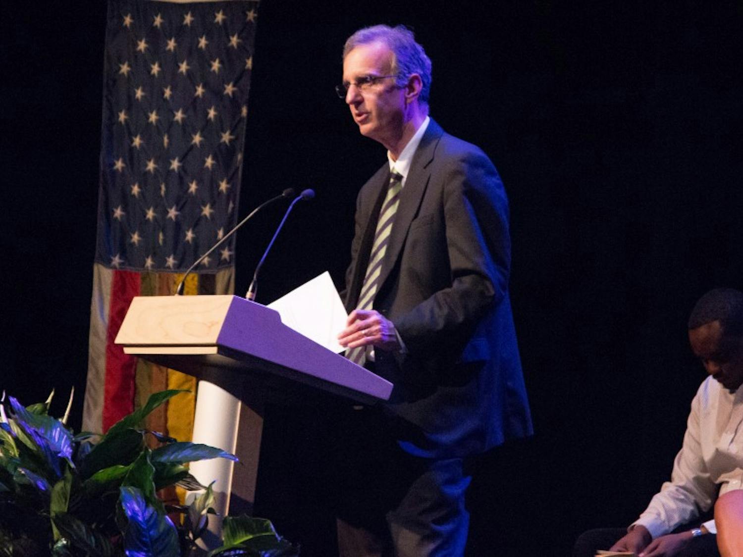 Dane County Executive Joe Parisi presented two recipients with Martin Luther King, Jr. Humanitarian Awards on Monday.
