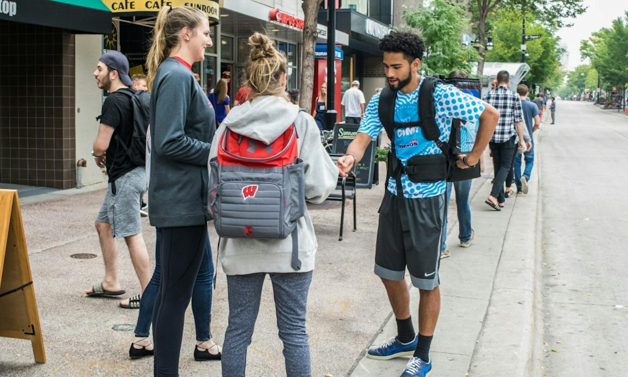 UW-Madison freshman Sam Jeschke successfully finished handing out 43,000 bottles of gum to the campus community Tuesday night at Camp Randall.