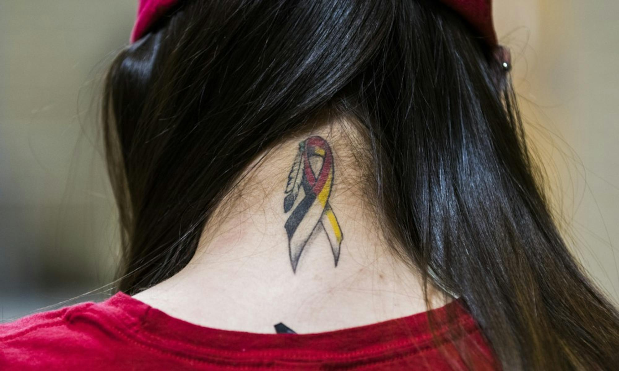 Mariah Skenandore has a tattoo on the back of her neck for missing and indigenous women, an issue surround the disproportionate amount of violence indigenous women face.