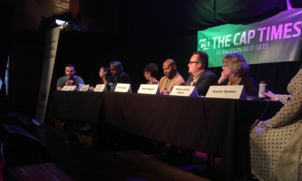 Panelists discuss the role of religion in politics at a panel Thursday night at the High Noon Saloon.