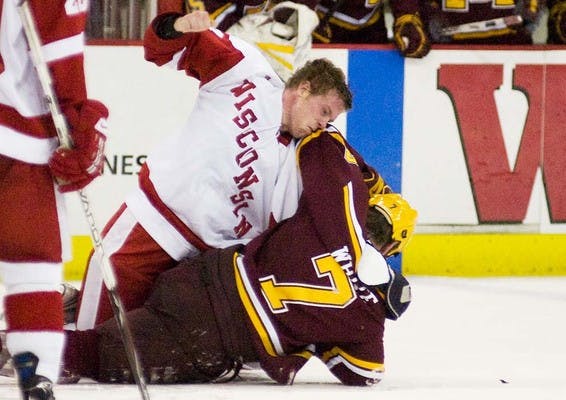 Despite home crowd and brawl, Badgers still winless