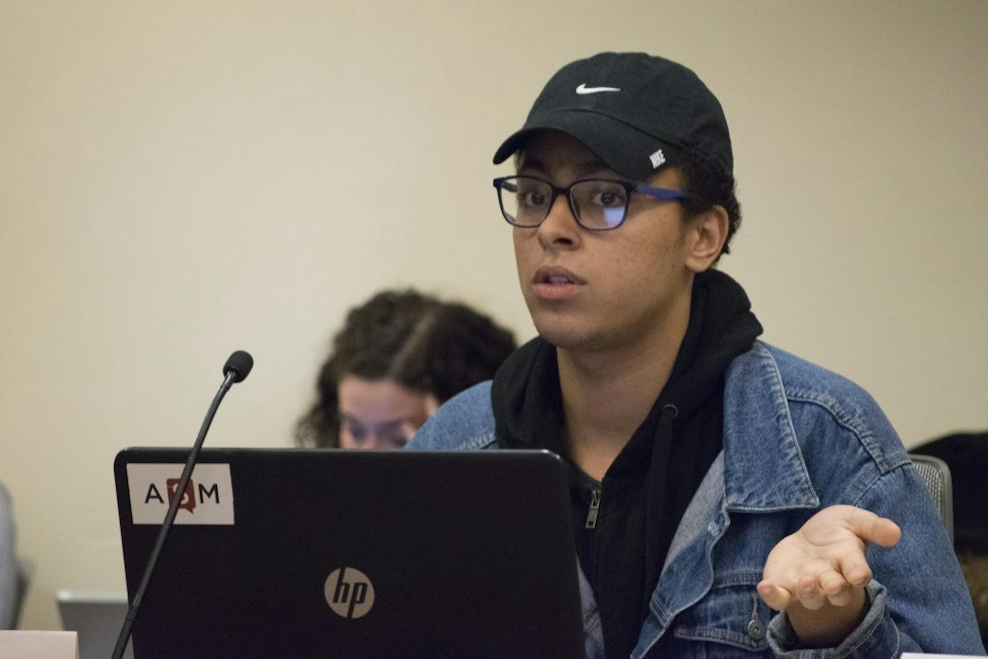 Representative Zaakir Abdul-wahid debated an amendment to decrease Wunk Sheek’s budget at Monday’s Student Service Finance Committee meeting.