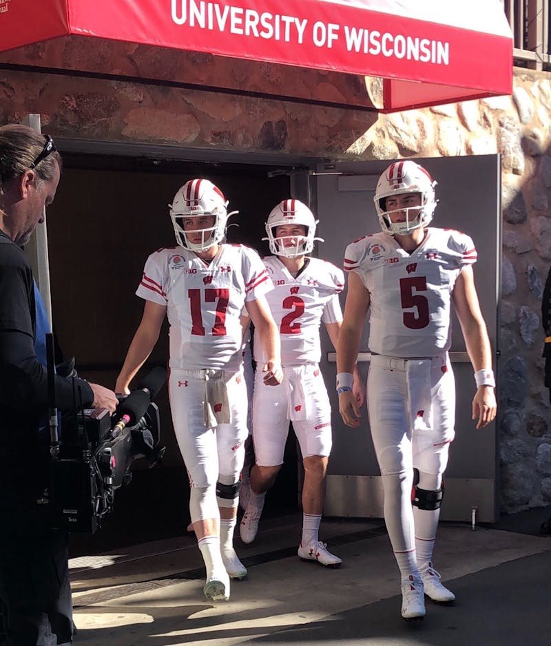 Wisconsin's quarterback room. Left to right: Jack Coan, Chase Wolf, and Graham Mertz.