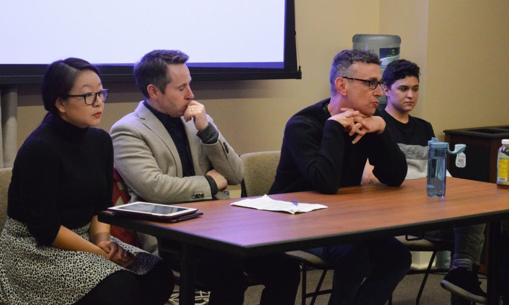 Graduate students Wendy Li and&nbsp;CV Vitolo-Haddad, along with&nbsp;professors Don Moynihan and Robert Asen, spoke as part of a panel discussion about the grad student tax increase Wednesday.