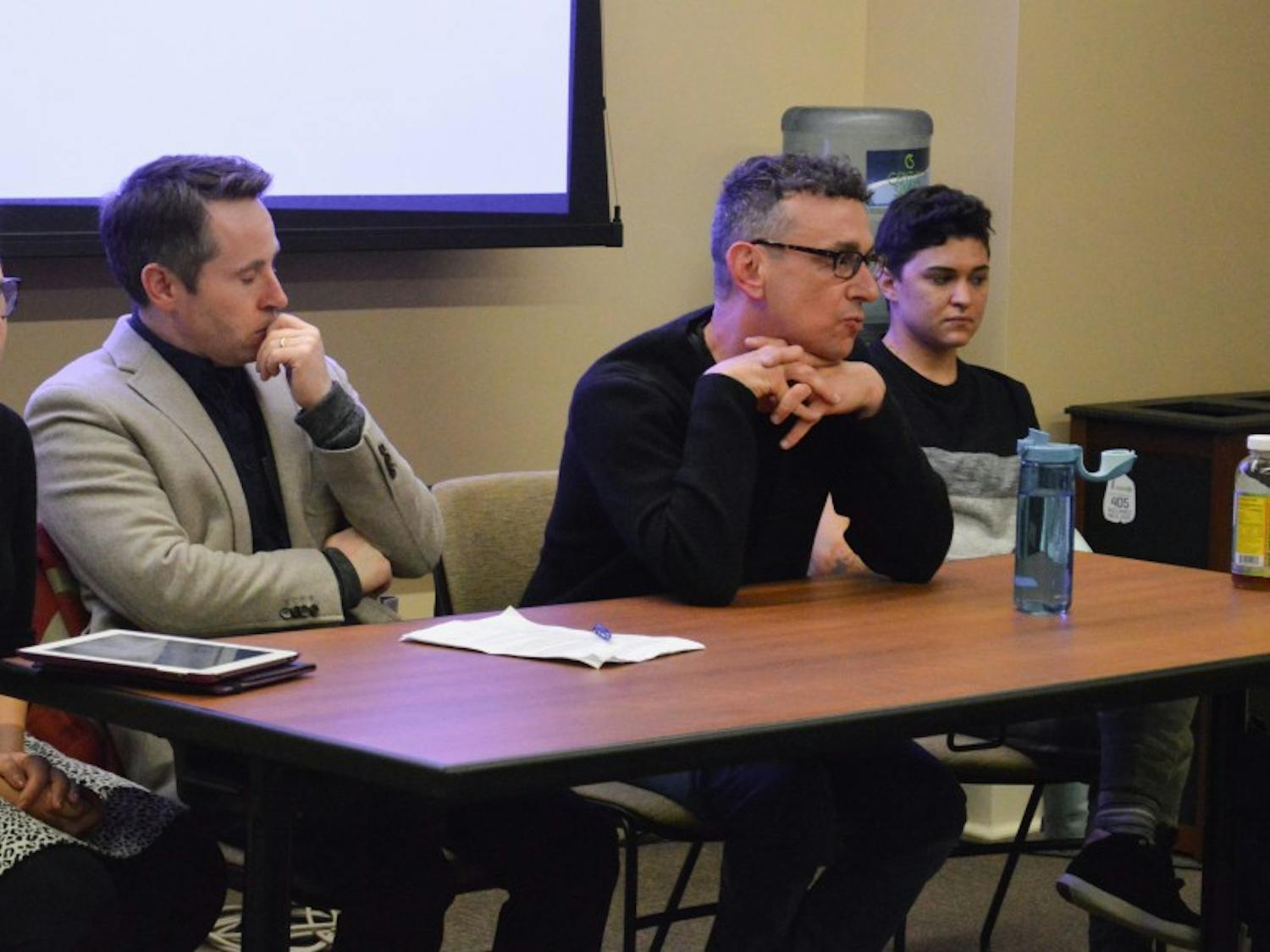 Graduate students Wendy Li and CV Vitolo-Haddad, along with professors Don Moynihan and Robert Asen, spoke as part of a panel discussion about the grad student tax increase Wednesday.