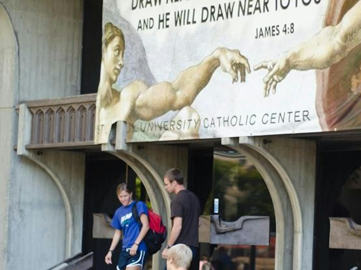 UW to pay Catholic group