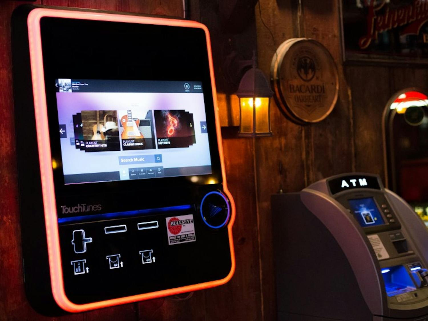 TouchTunes jukeboxes allow users to choose from thousands of songs, but hip-hop artists are unavailable on some in campus-area bars.