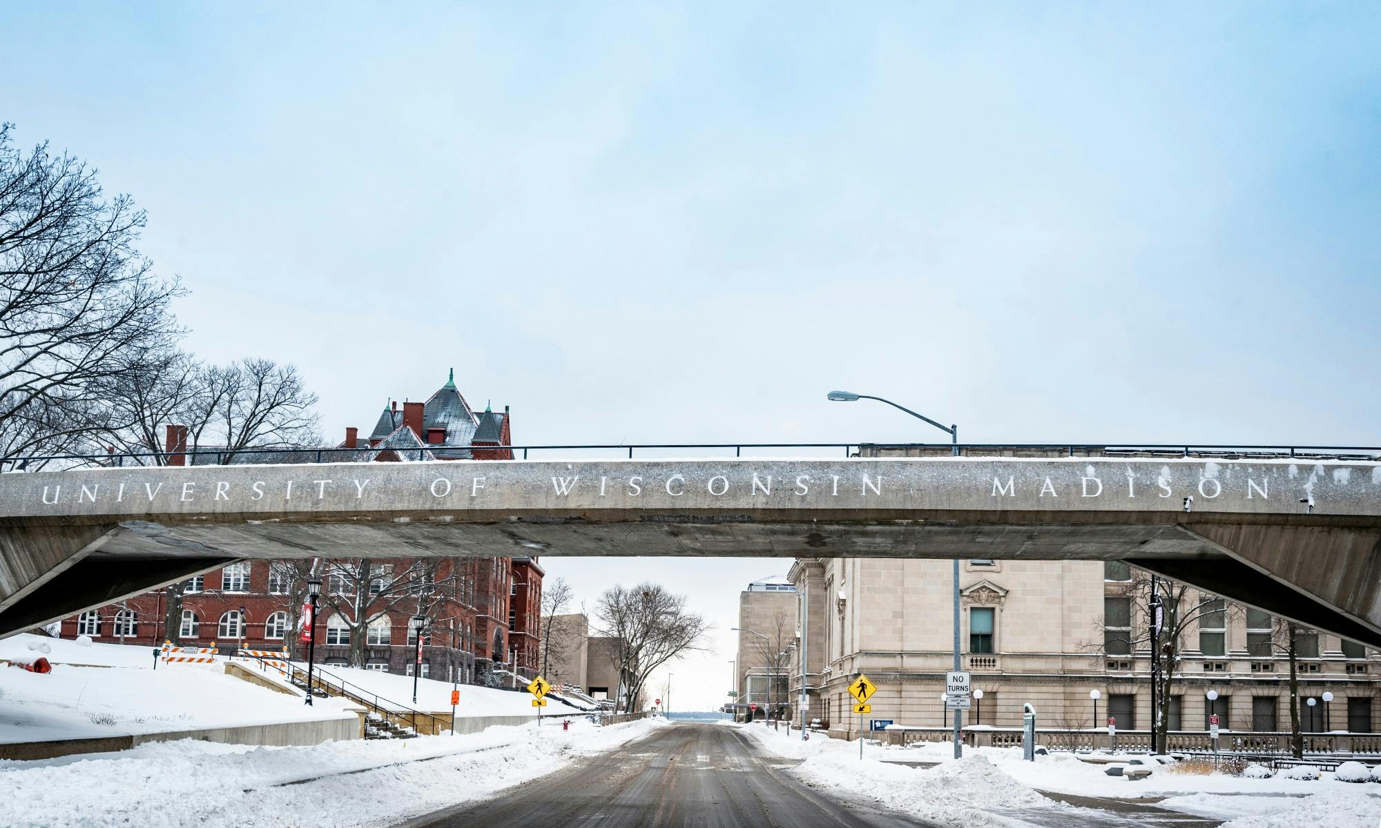 Pictures the UW-Madison campus in the snow and the footbridge between Bascom Hill and Mosse Humanities