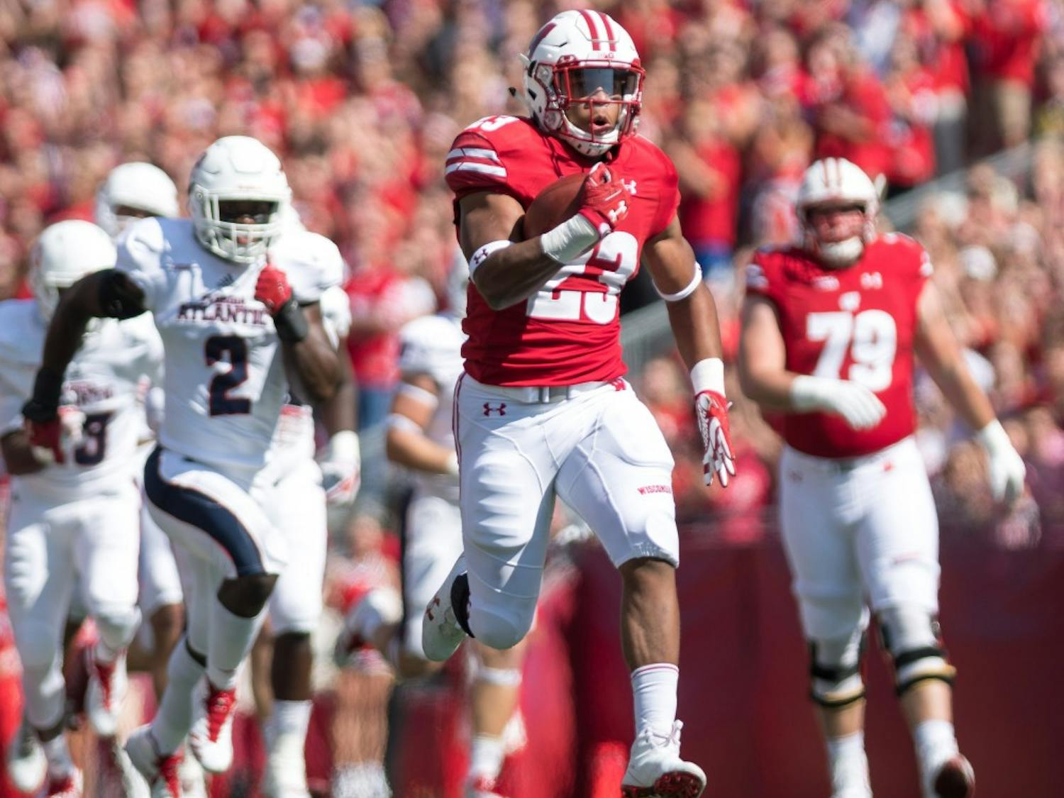 Freshman running back Jonathan Taylor had a historic day on the ground, finishing UW's win over Florida Atlantic with 223 yards and three touchdowns. 