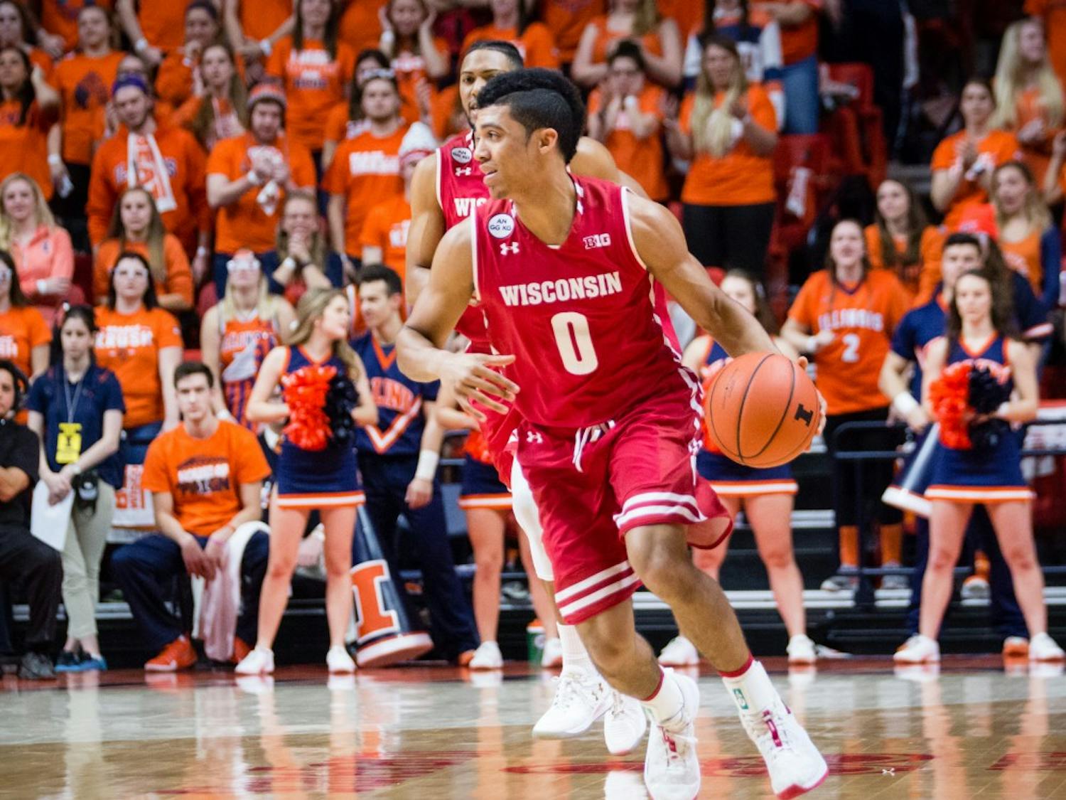 Wisconsin's D'Mitrik Trice (0) brings the ball down the court during the game against Illinois at State Farm Center on Tuesday, January 31.