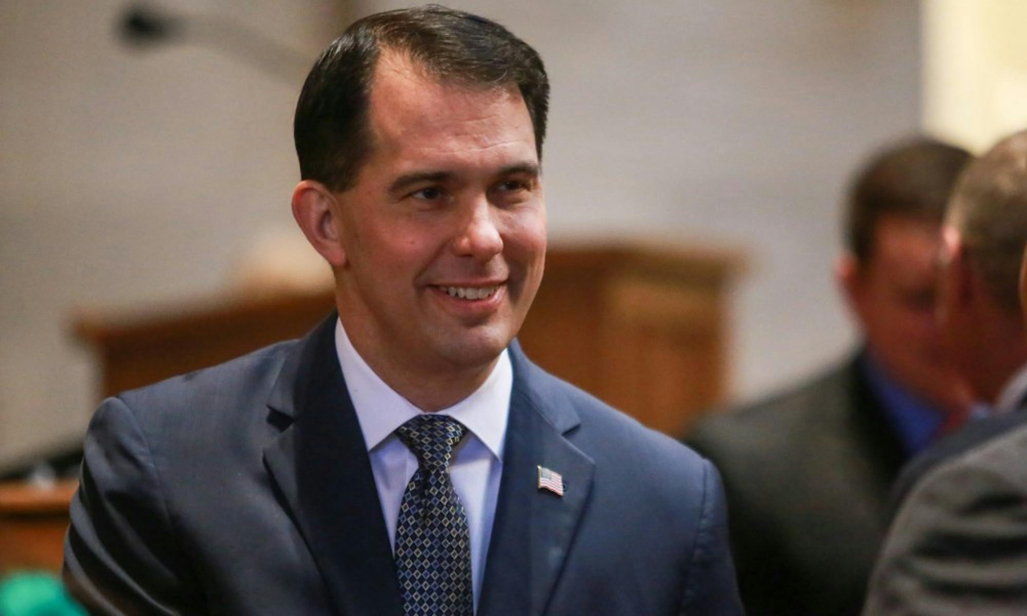 Gov. Scott Walker signed two bills Monday aimed at helping homeless individuals.