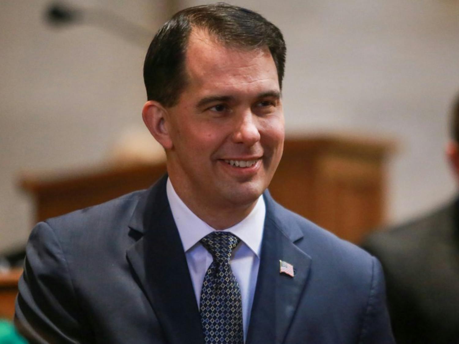 Gov. Scott Walker signed two bills Monday aimed at helping homeless individuals.