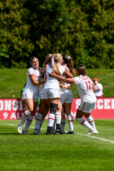 Wisconsin surges past Iowa 3-0, advances to Big Ten semifinals