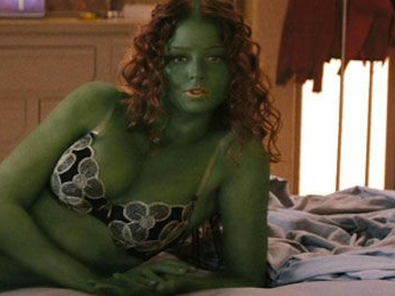 This "woman" has green skin