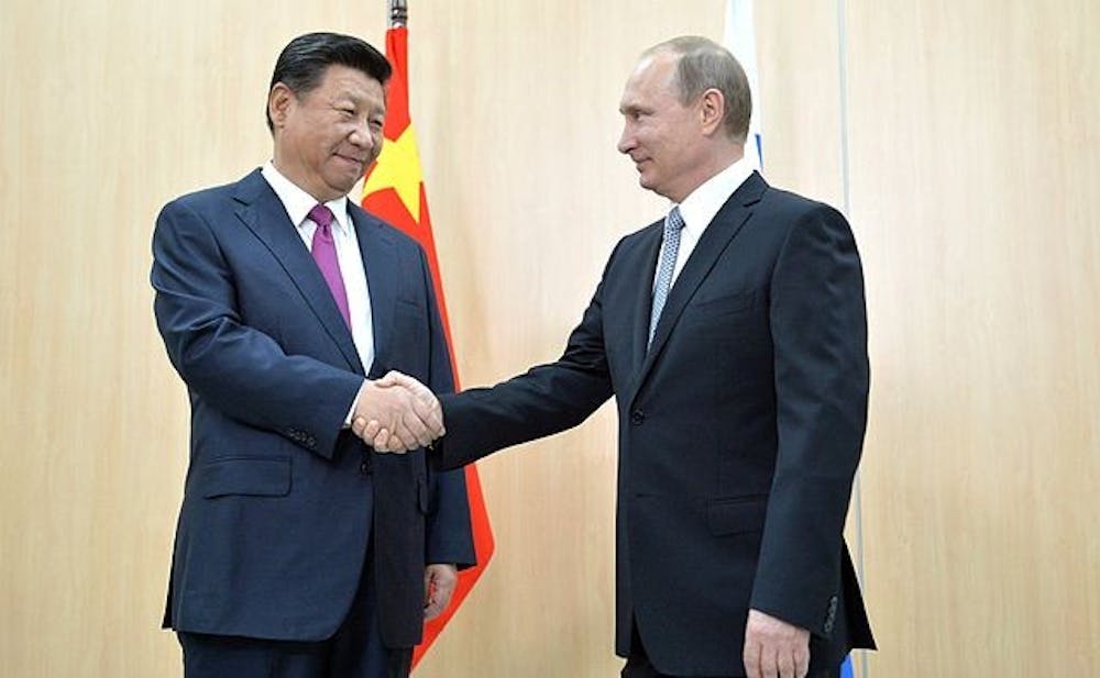 Vladimir_Putin_and_Xi_Jinping,_BRICS_summit_2015_01.jpg