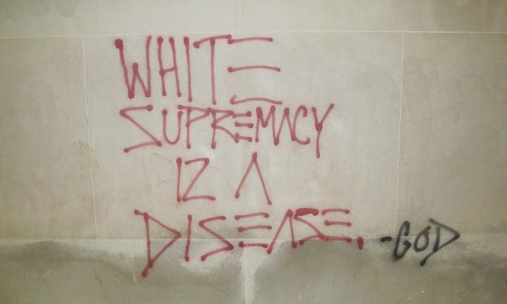 A UW-Madison student was arrested Thursday in connection to 11 incidents of graffiti that highlighted racism on campus.&nbsp;