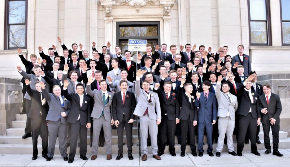 The Baraboo School District is investigating a photo posted to Twitter Sunday night showing dozens of Baraboo High School students giving a Nazi salute on the steps of the Sauk County Courthouse.