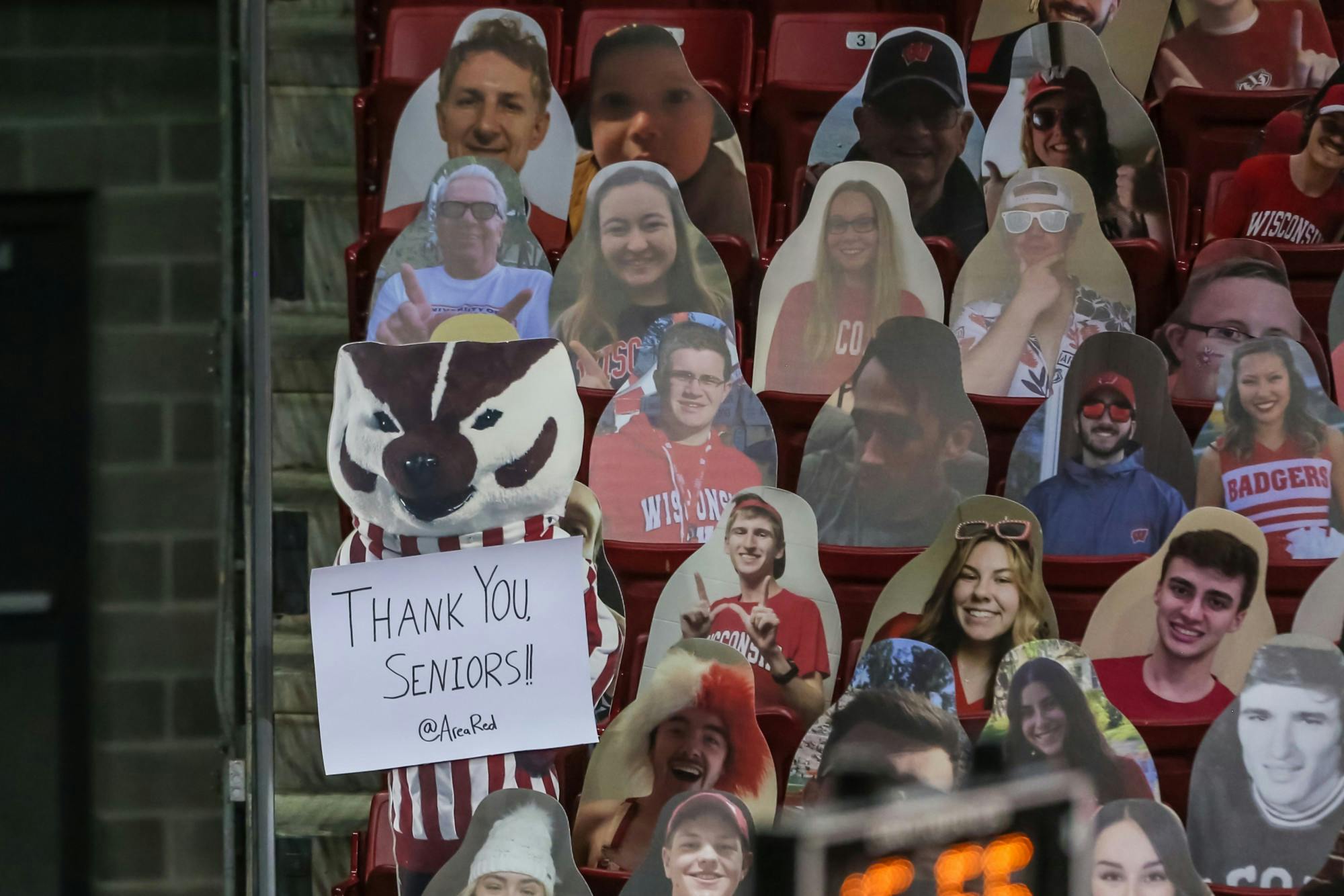 Cardboard cutouts of fans fill the Kohl Center.