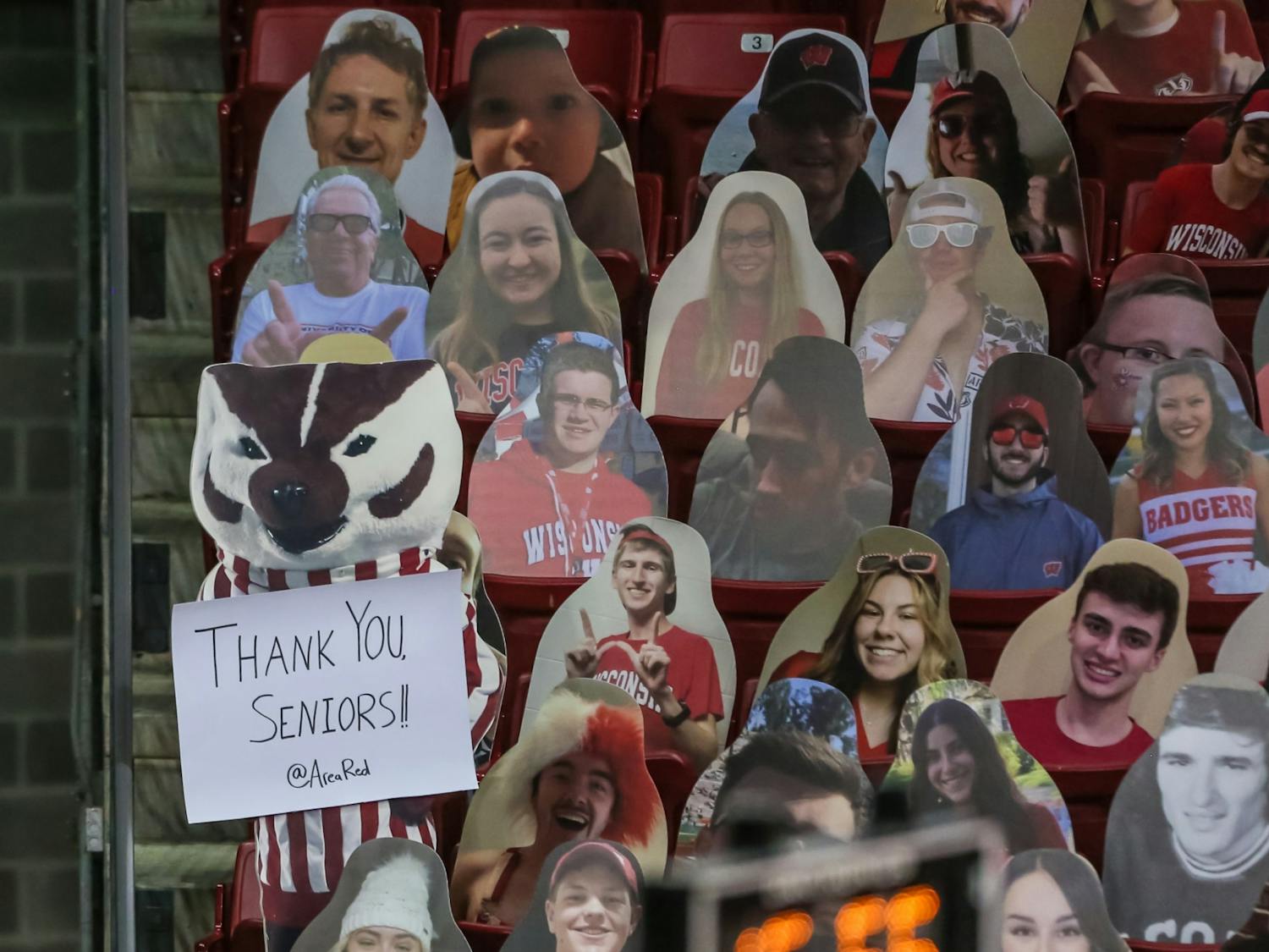 Cardboard cutouts of fans fill the Kohl Center.