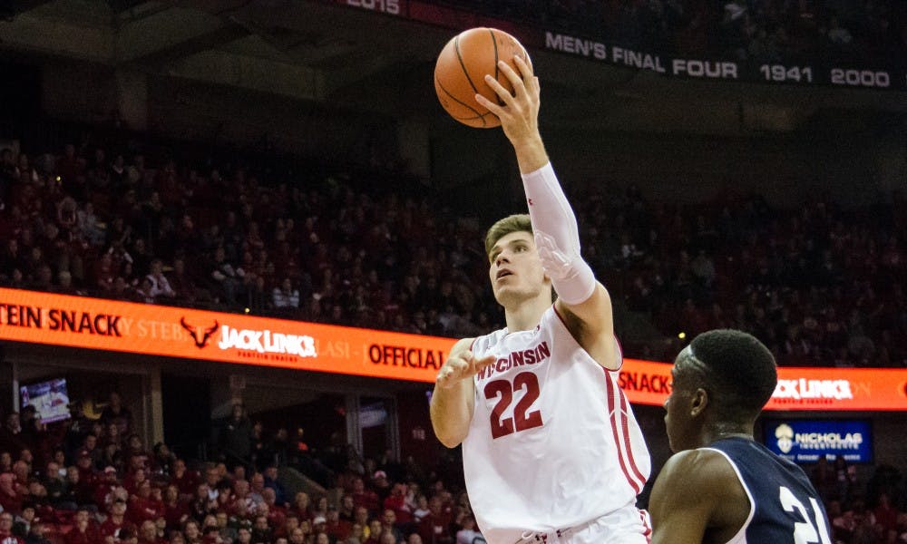 Senior forward Ethan Happ scored his 2000th career point with six minutes left Tuesday night, but the Badgers couldn't find any other offense down the stretch in a loss.