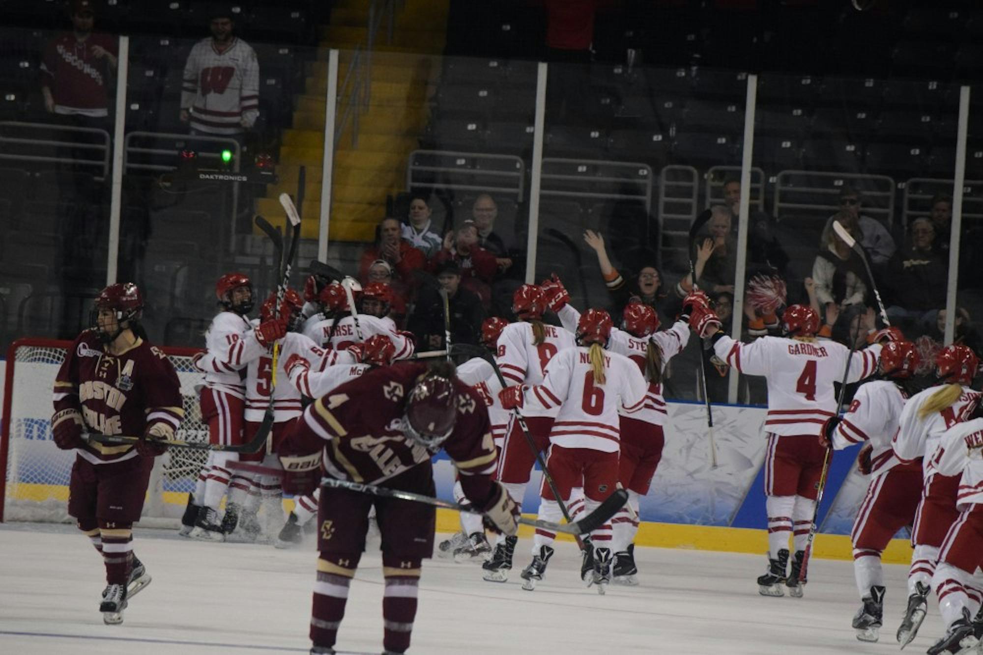 Wisconsin celebrates its win over Boston College in the national semi-final, which sent them to the national title, a contest which they dropped to Clarkson.&nbsp;