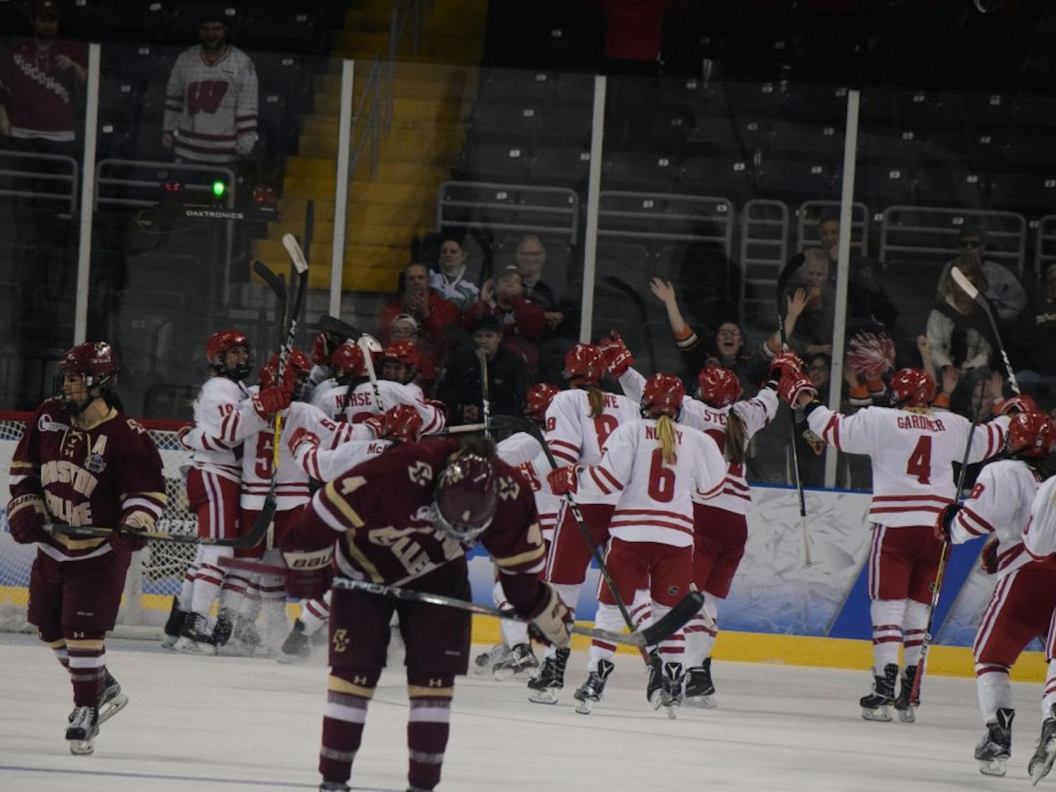 Wisconsin celebrates its win over Boston College in the national semi-final, which sent them to the national title, a contest which they dropped to Clarkson.&nbsp;