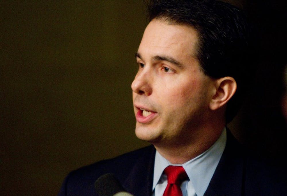 Walker outlines platform on job growth, taxes