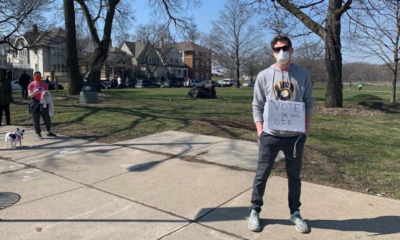 With the nation watching, some Wisconsin voters waited two hours in long lines as the spring election was held despite fears over coronavirus. 
