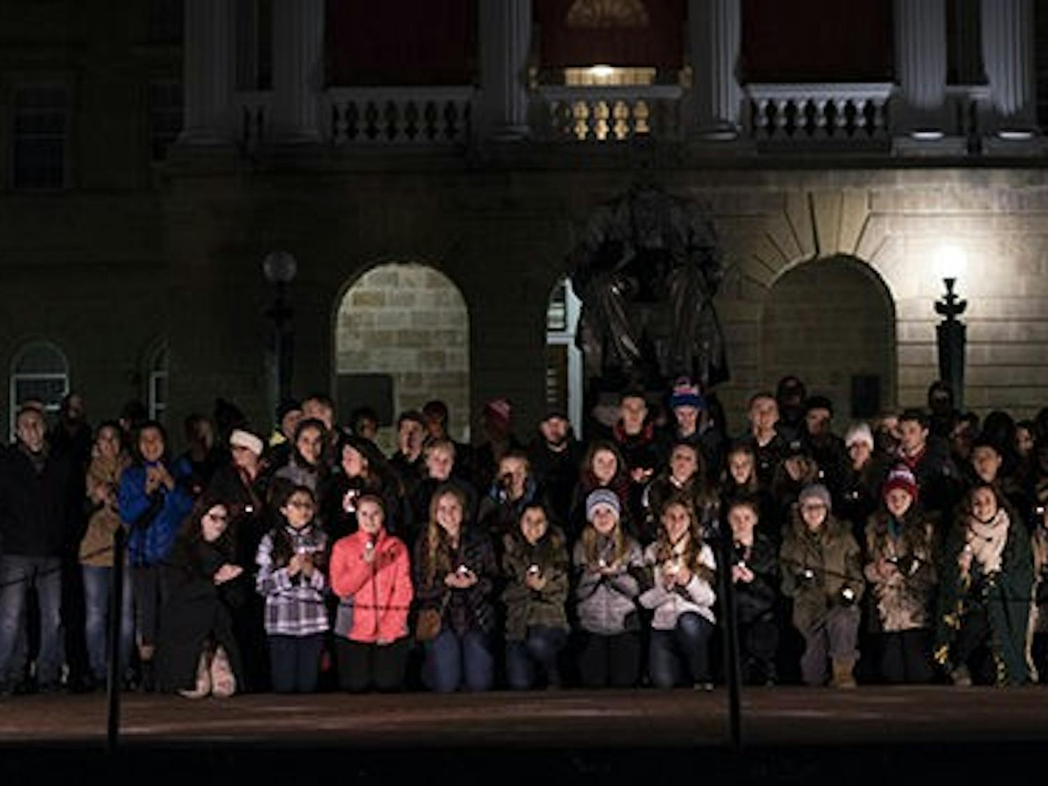 Students at UW-Madison gathered on Bascom Hill in mourning of the recent terrorist attacks in Paris. This display of solidarity stands in contrast to the political commentary and bashing that has become common.