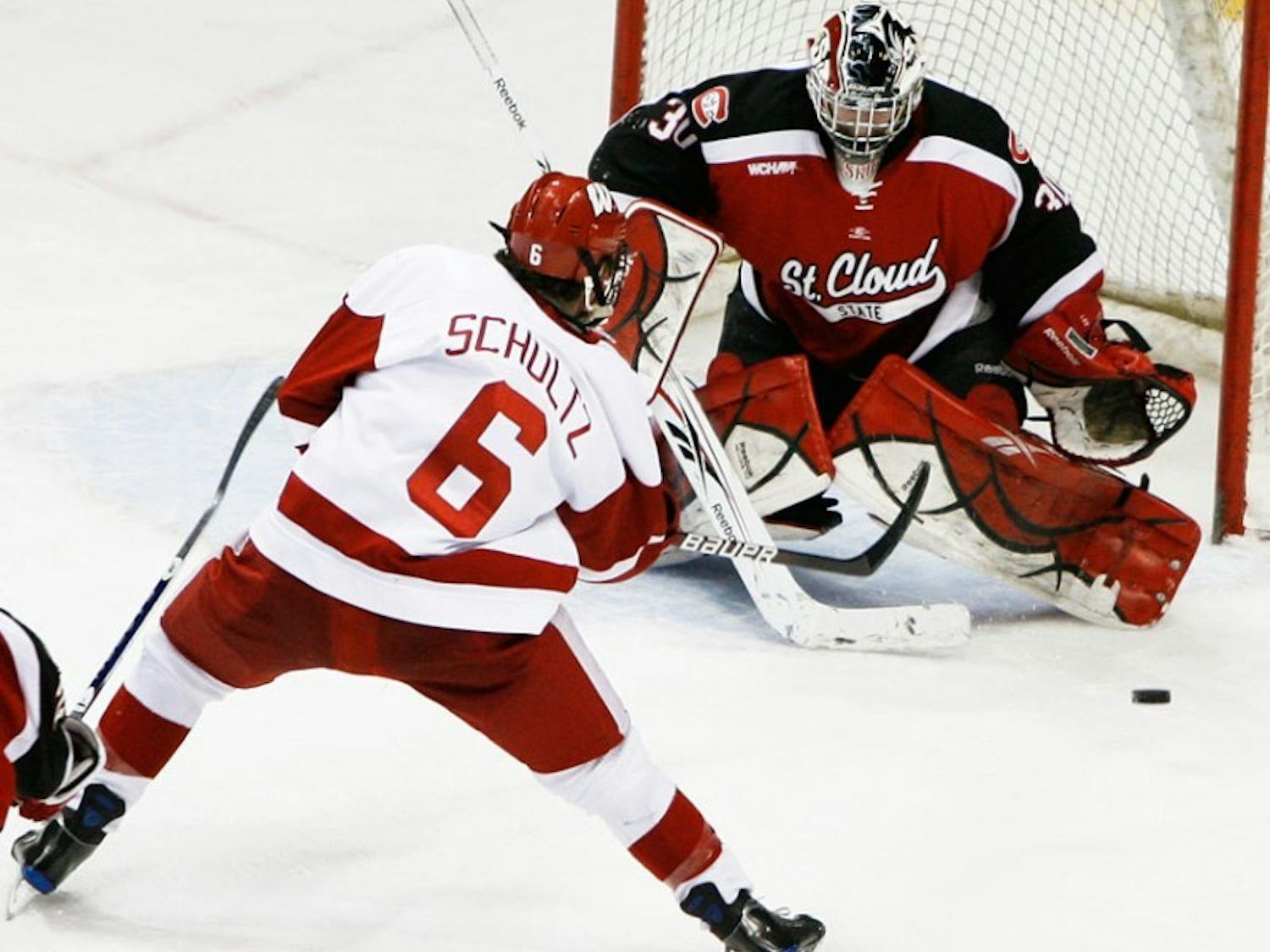 UW shut down by one goalie before overmatching the next