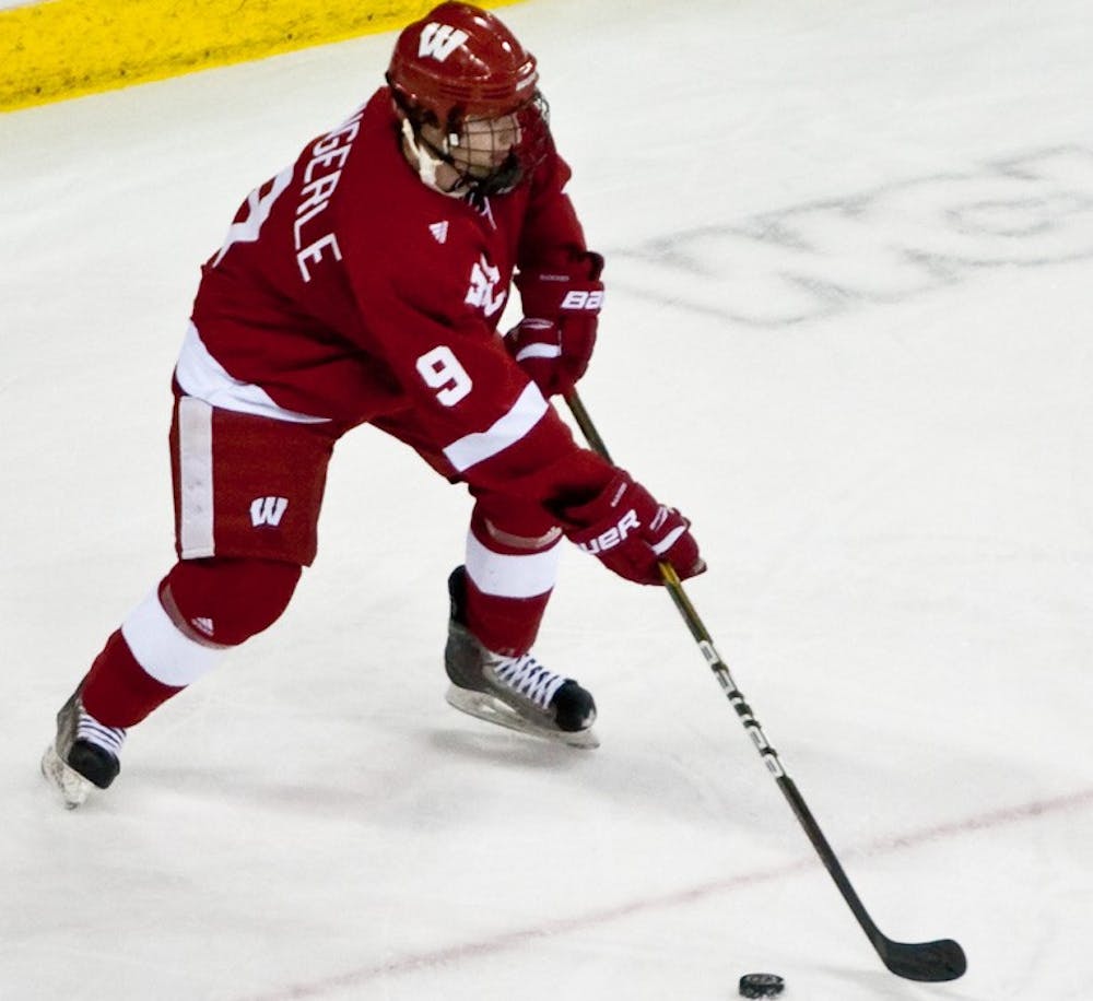 Wisconsin opens up WCHA play with loss, tie on road against Denver