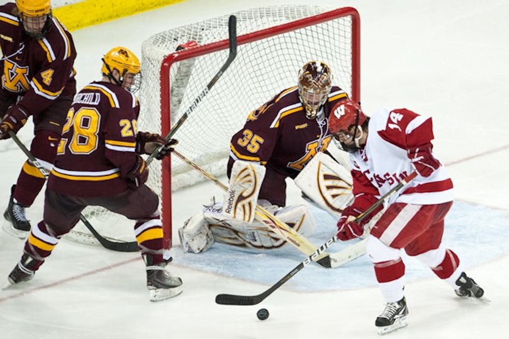 Badgers salvage a point from border battle series