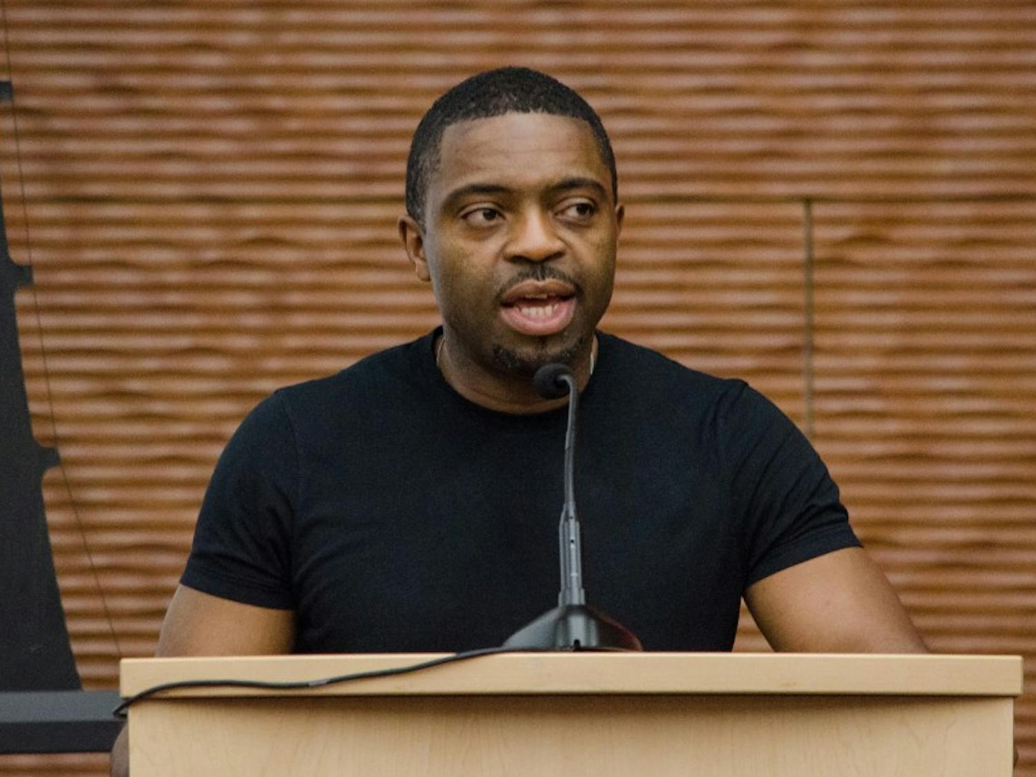 Abdu’Allah showed the audience at Gordon Commons pictures of his artwork, which have been exhibited in galleries around the world, including the Chazen Museum on campus.