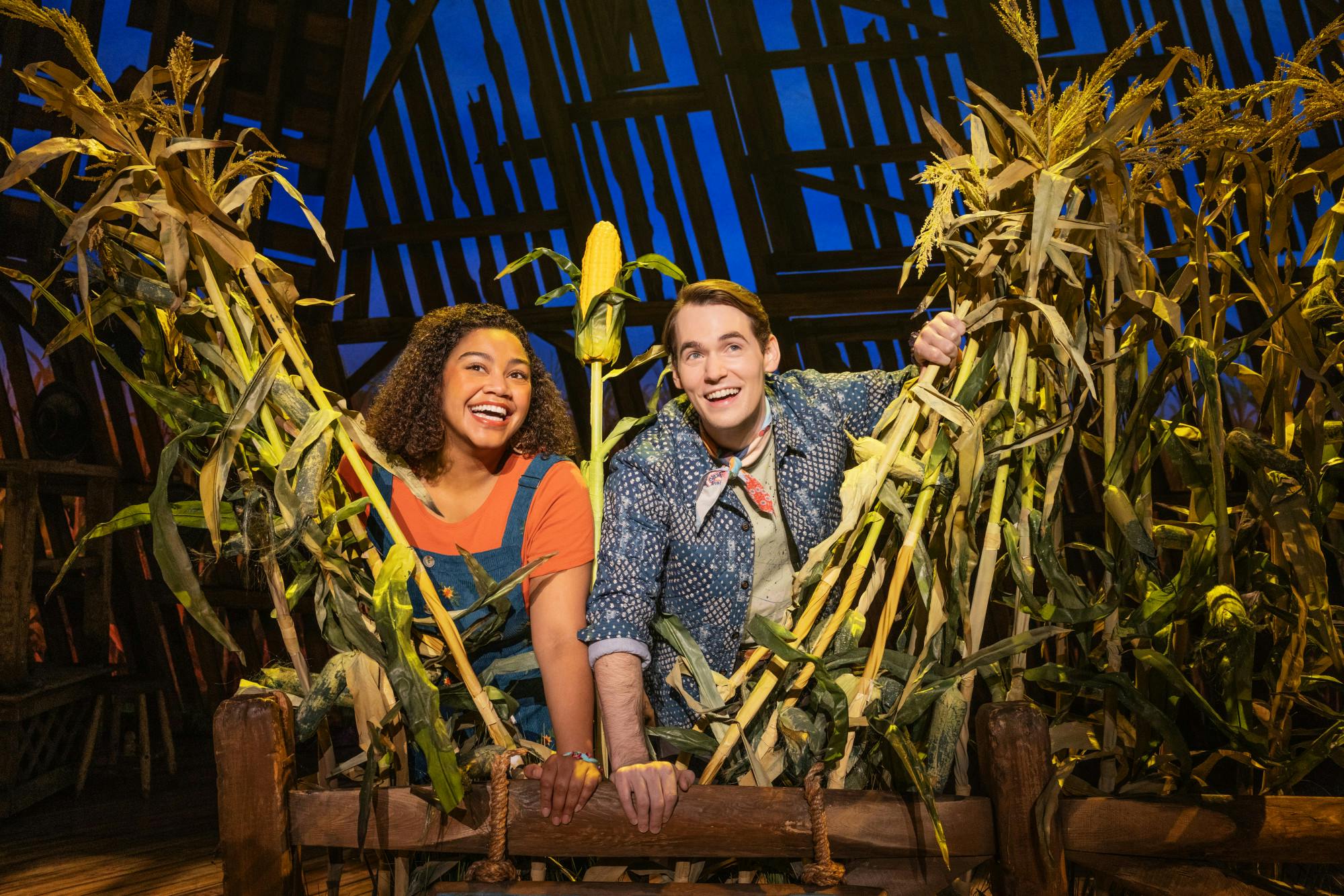 Maya Lagerstam as Storyteller 1 and Tyler Joseph Ellis as Storyteller 2 in The North American Tour of SHUCKED (Photo by Matthew Murphy and Evan Zimmerman) 0861.jpg