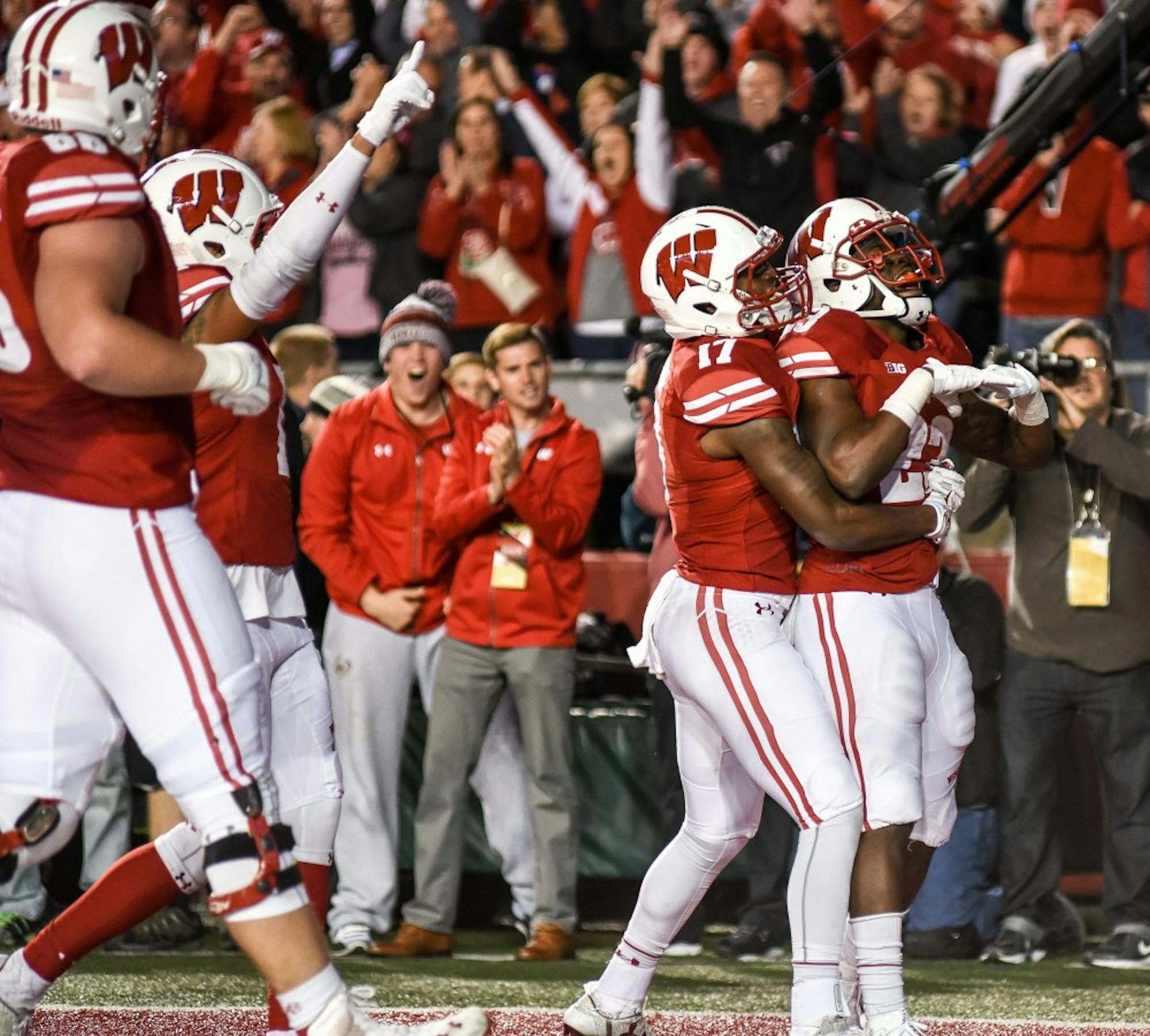 Dare Ogunbowale is embraced by George Rushing after scoring the game-winning touchdown in overtime.&nbsp;