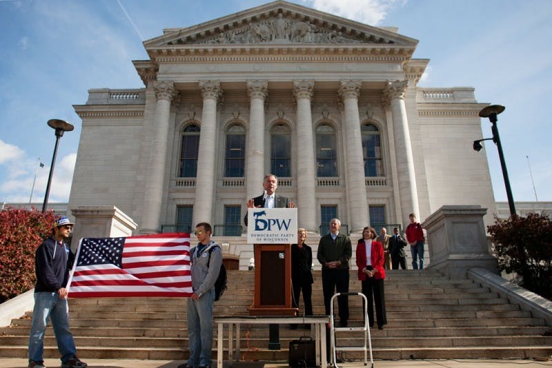 Democratic National Committee Chairman Tim Kaine urges early voting