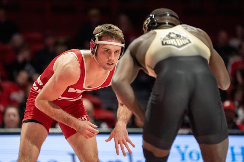 Wisconsin wrestling on ‘upward trajectory’ after splitting weekend home