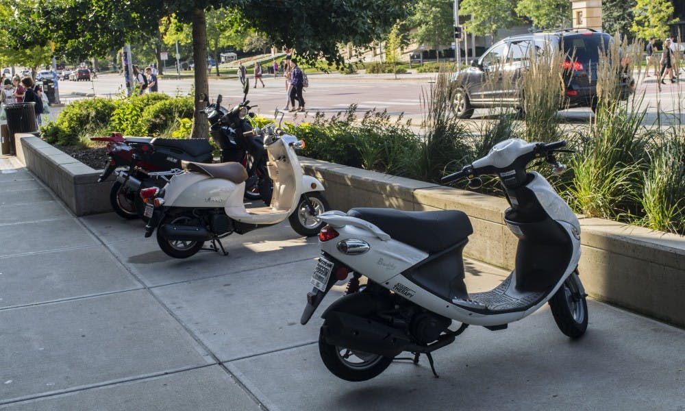 A new city law that takes effect in January will change where mopeds can be parked in Madison.