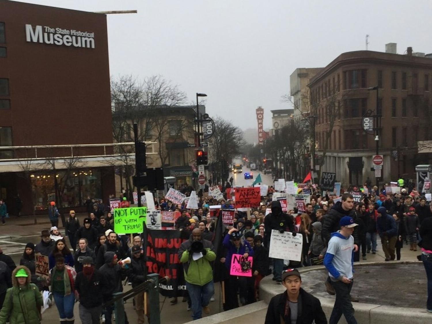 After students walked out of classes to protest Trump's inauguration Friday, some joined a city-wide rally and march in downtown Madison.