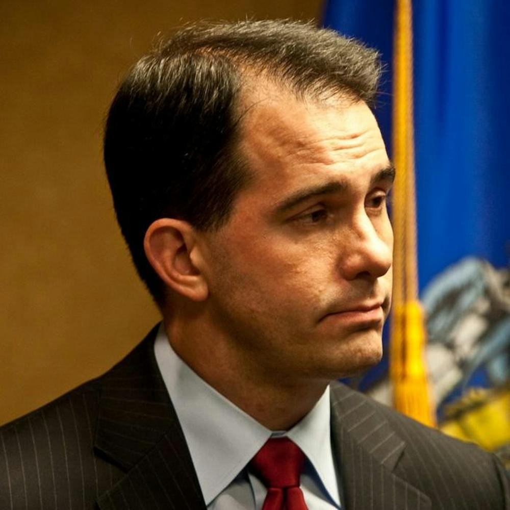 Walker promises limited government at inauguration