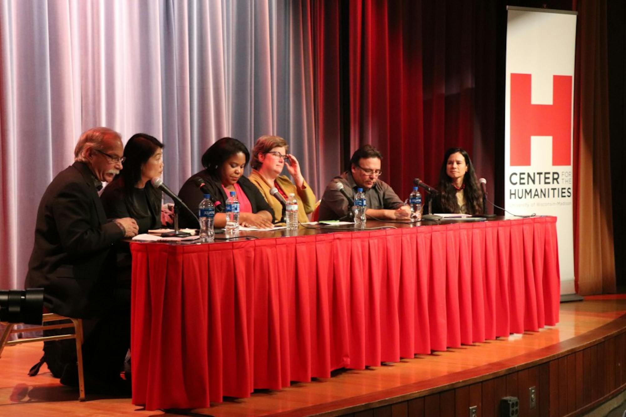 Panelists engage in an interdisciplinary discussion on race and immigration prompted by recent ICE arrests in Madison.