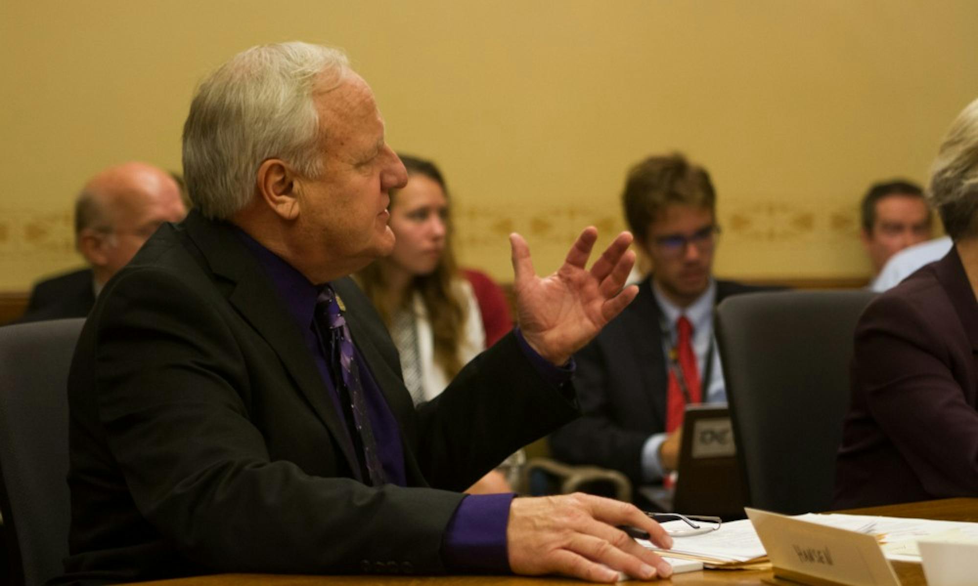 State Sen. Dave Hansen, D-Green Bay, hears testimony on a bill he introduced last year, which allows students to refinance their loans.