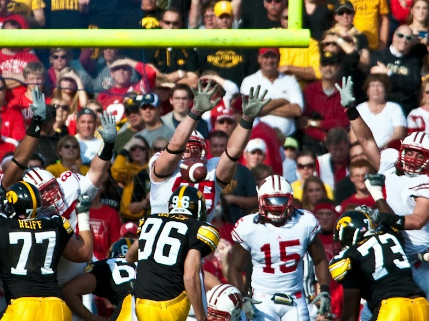 Badgers topple Iowa in classic grit match