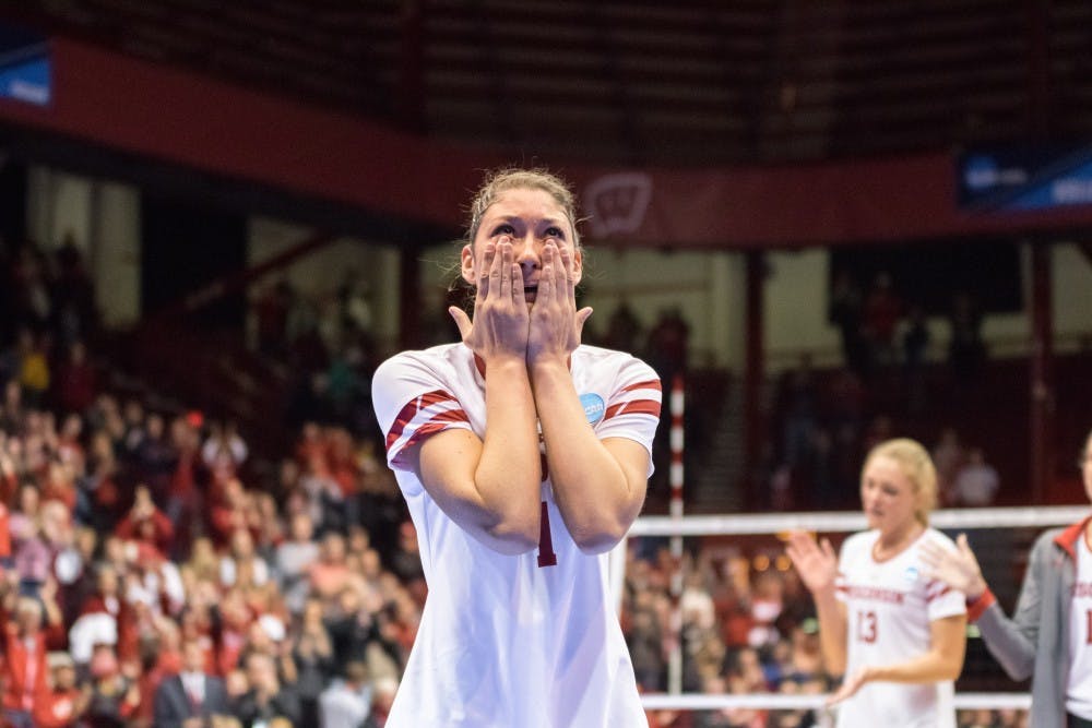 Lauren Carlini wipes tears from her eyes as she says goodbye to a standing ovation from the Wisconsin faithful.&nbsp;